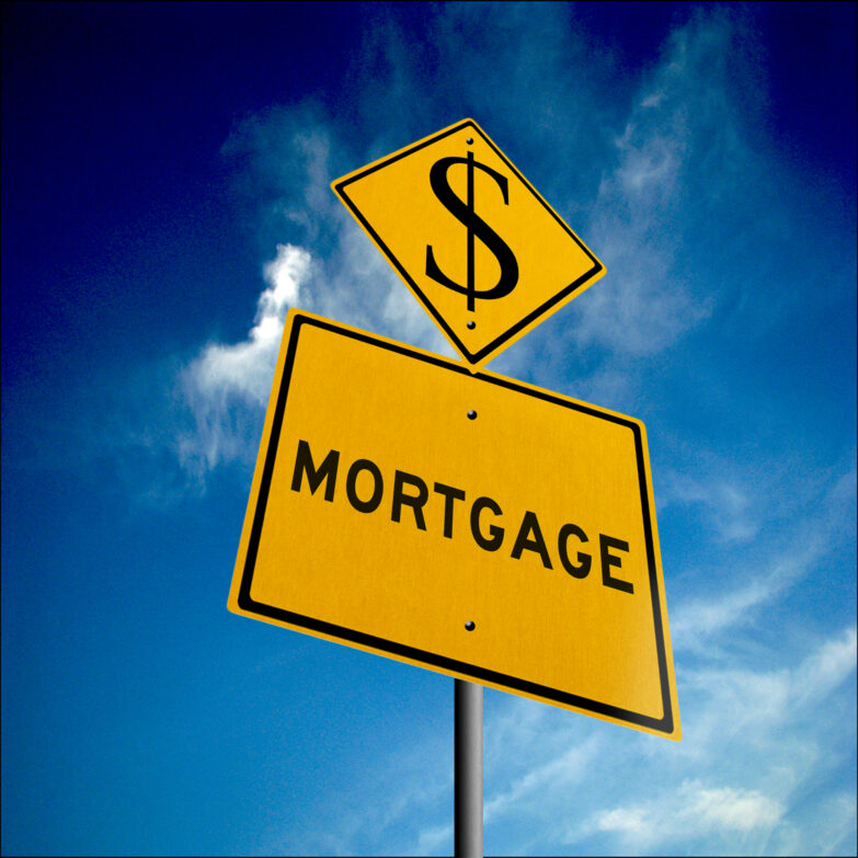 A yellow sign with the word "Mortgage" written on it in black with a $ sign at the top and a blue sky background.